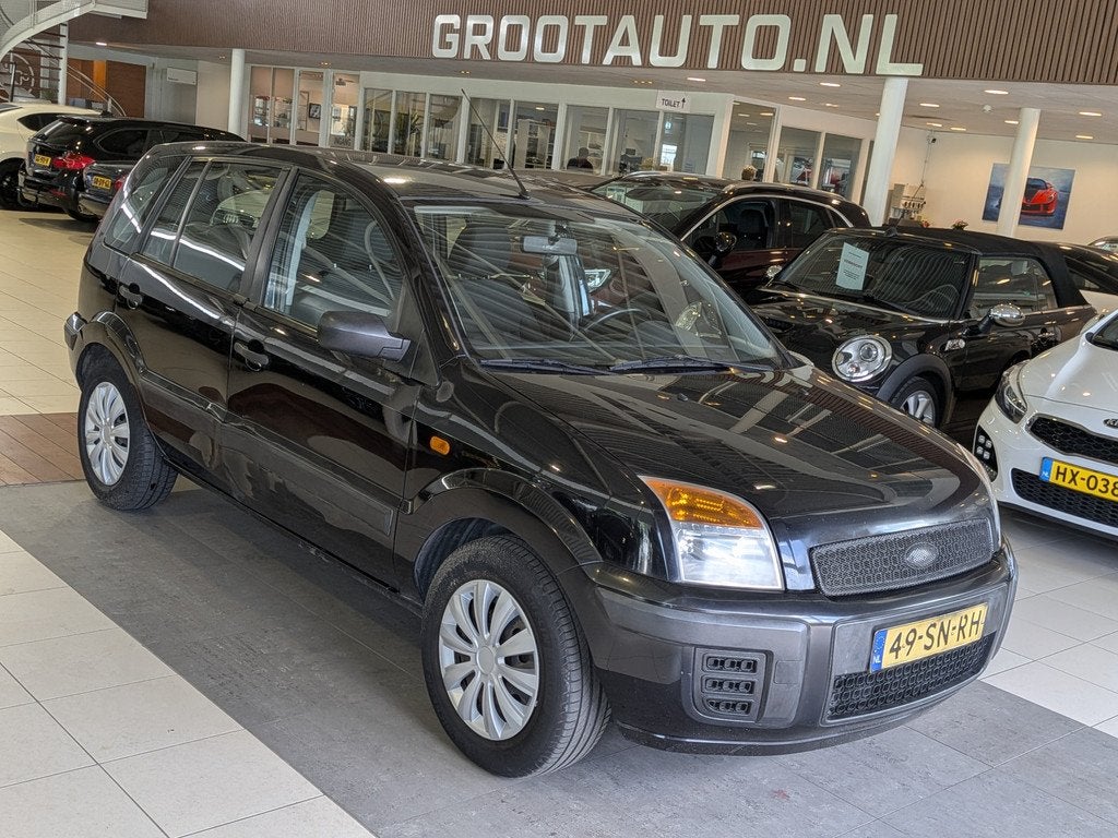 Ford Fusion 1.4-16V Champion Airco, Trekhaak, Stuurbekrachti, Auto's, Ford, Voorwielaandrijving, 82 pk, Zwart, Origineel Nederlands