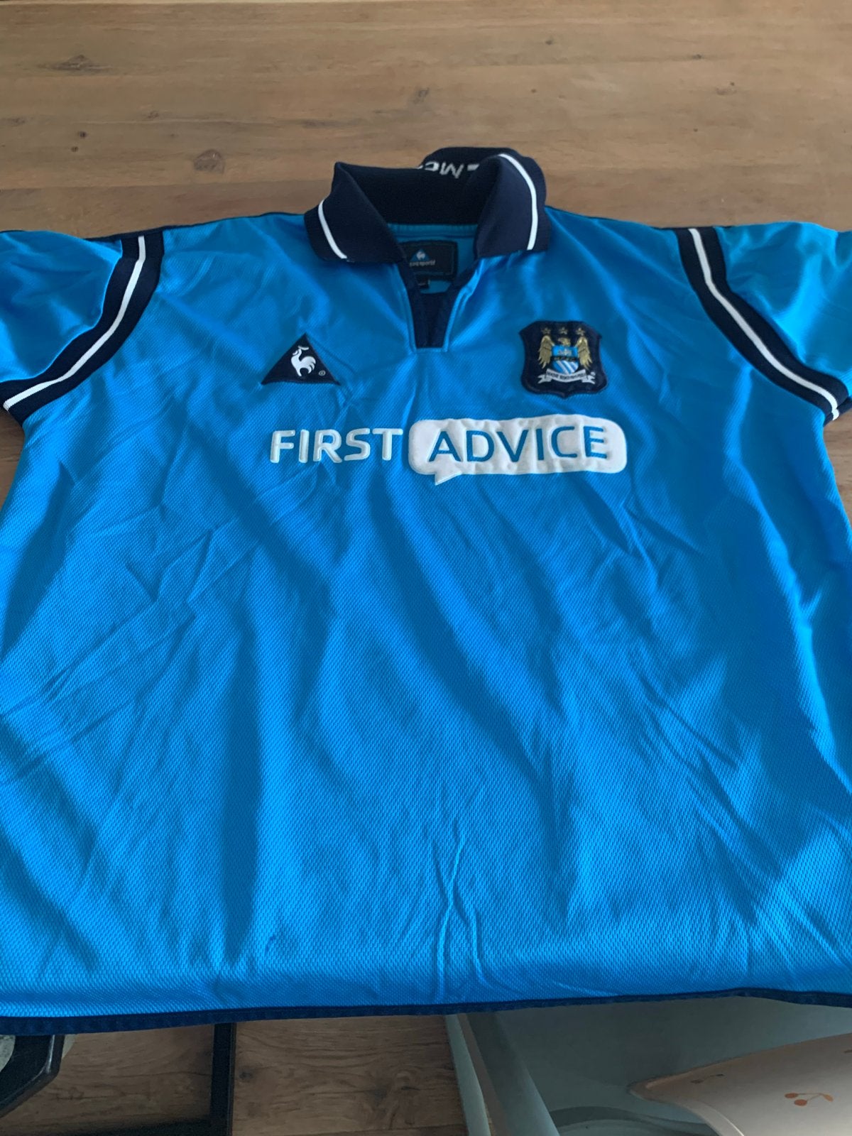 Manchester City shirt - Le Coq Sportif - Maat 42/44 (L), Sport en Fitness, Ophalen of Verzenden, Gebruikt