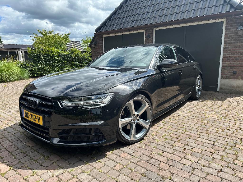 Audi A6  limousine met nieuwe apk!!!, Auto's, Zwart, 4 cilinders, Leder en Stof, Zwart