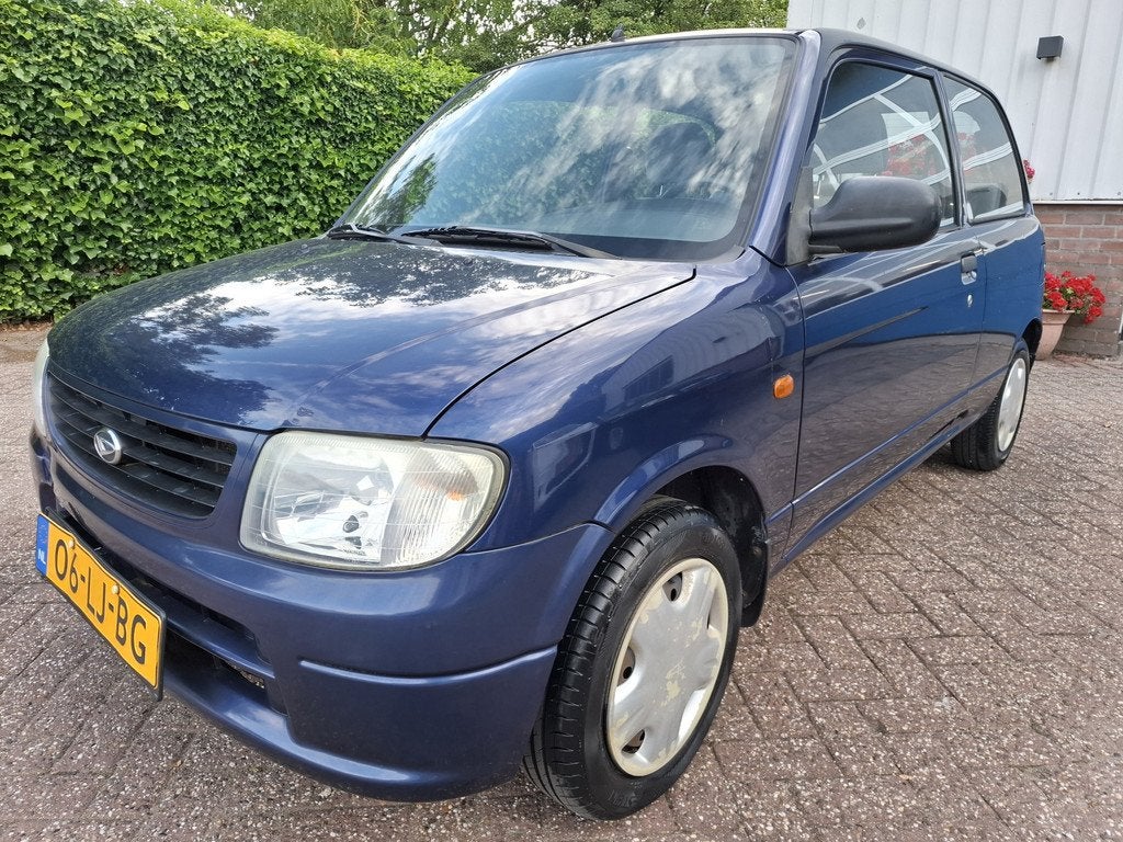 Daihatsu Cuore 1.0-12V DVVT XTi AUTOMAAT NIEUWE APK 58PK, Auto's, Daihatsu, Airbags, 18 €/maand, Cuore, Origineel Nederlands