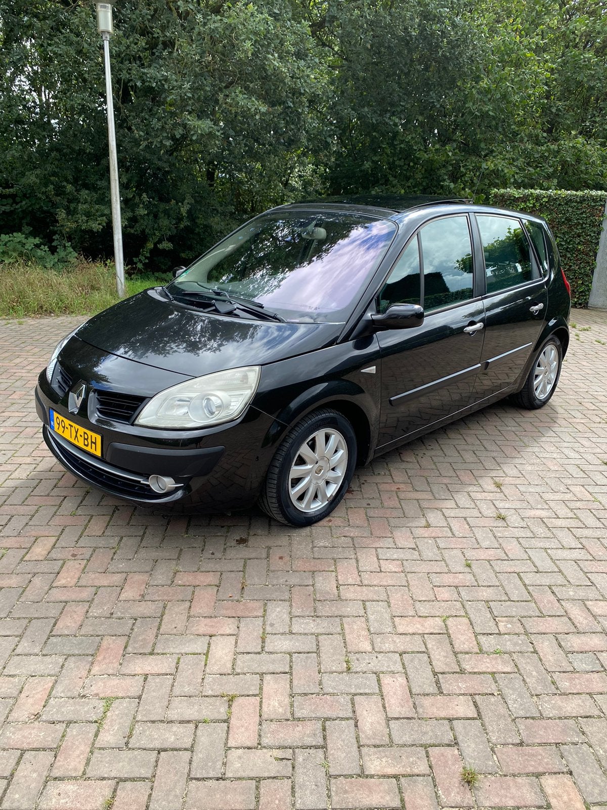 Renault Scénic 1.6 16V 82KW 2007 Zwart, Auto's, Stof, 4 cilinders, Zwart, Origineel Nederlands