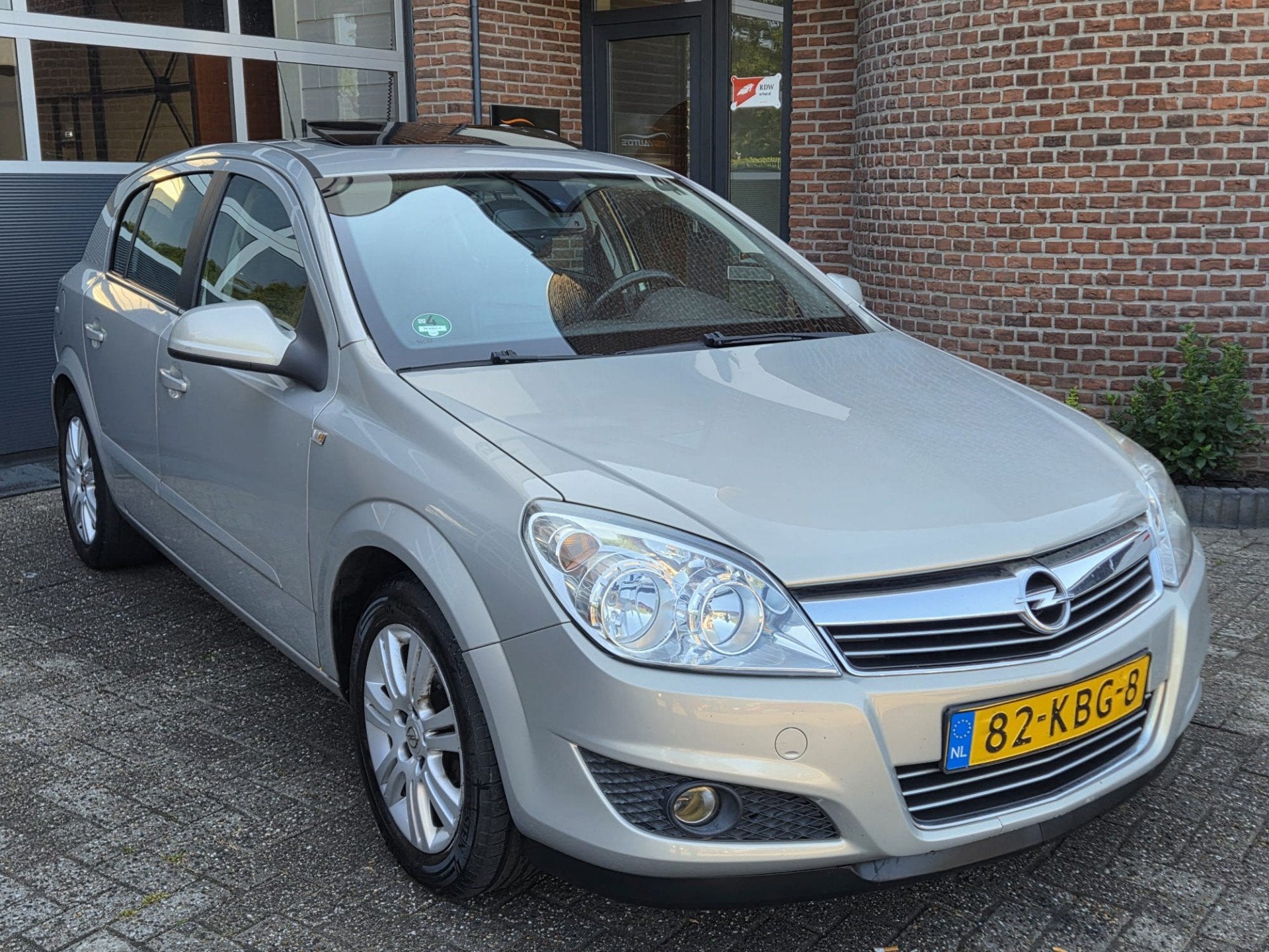 Opel Astra 1.6 Cosmo | Cruise | Clima | Leer | LM Velgen |, Auto's, Voorwielaandrijving, 15 km/l, Gebruikt, 4 cilinders