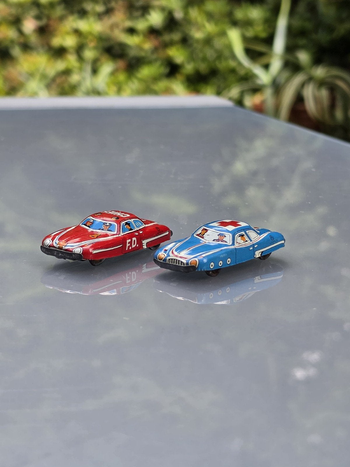 2x oude blikken mini speelgoed auto Japan penny toy, Antiek en Kunst, Ophalen of Verzenden