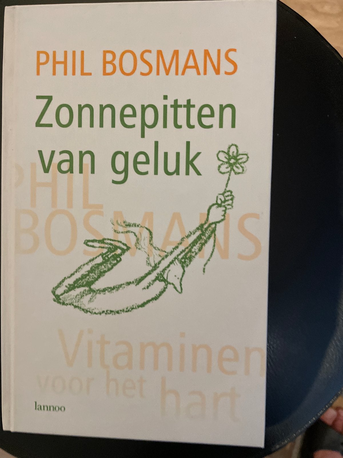 Zonnepitten van geluk - Phil Bosmans, Ophalen of Verzenden, Zo goed als nieuw, Nederland