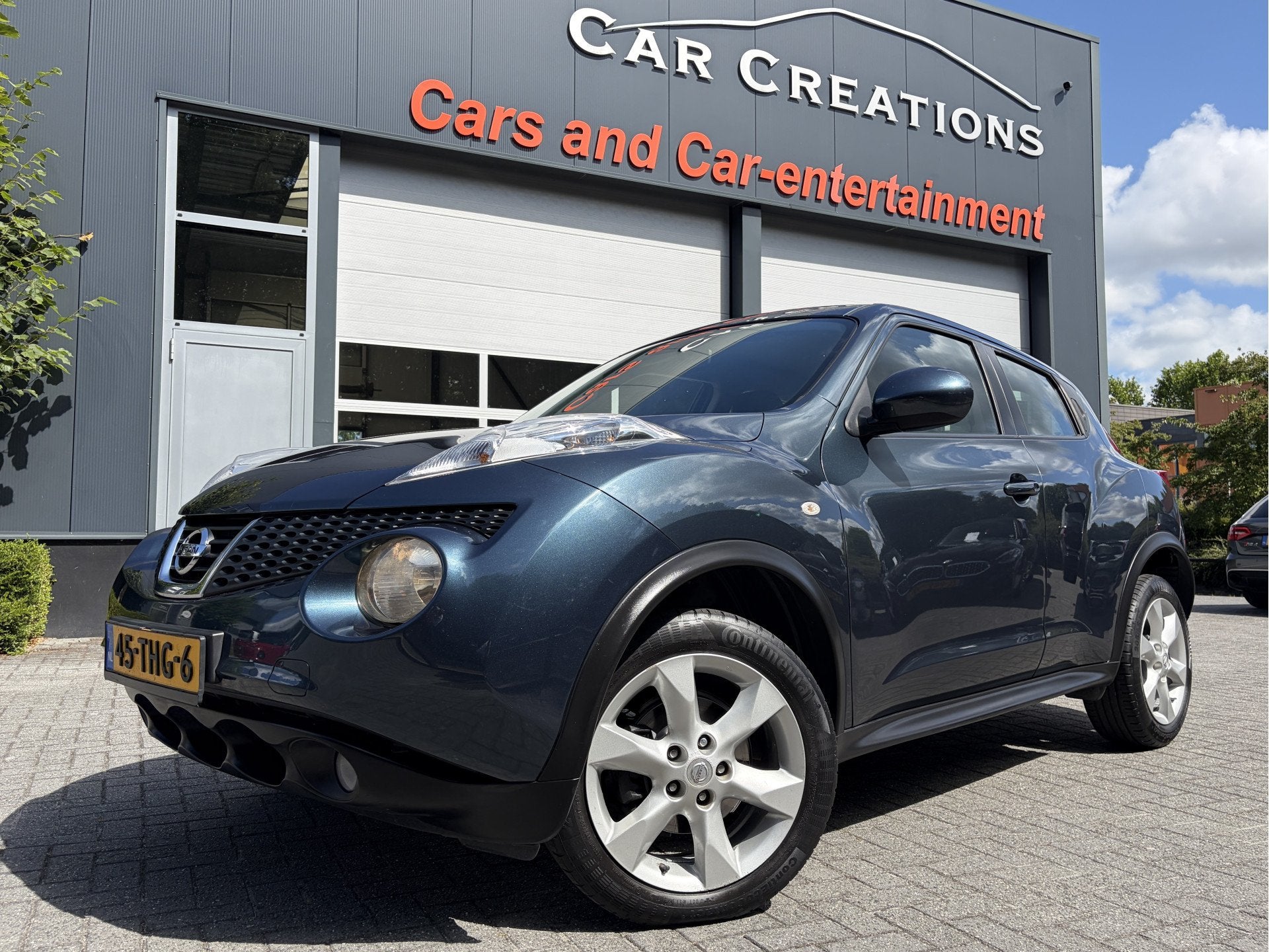 Nissan Juke 1.6 Acenta (bj 2010, automaat), Auto's, Nissan, Euro 5, Stof, 4 cilinders, Blauw