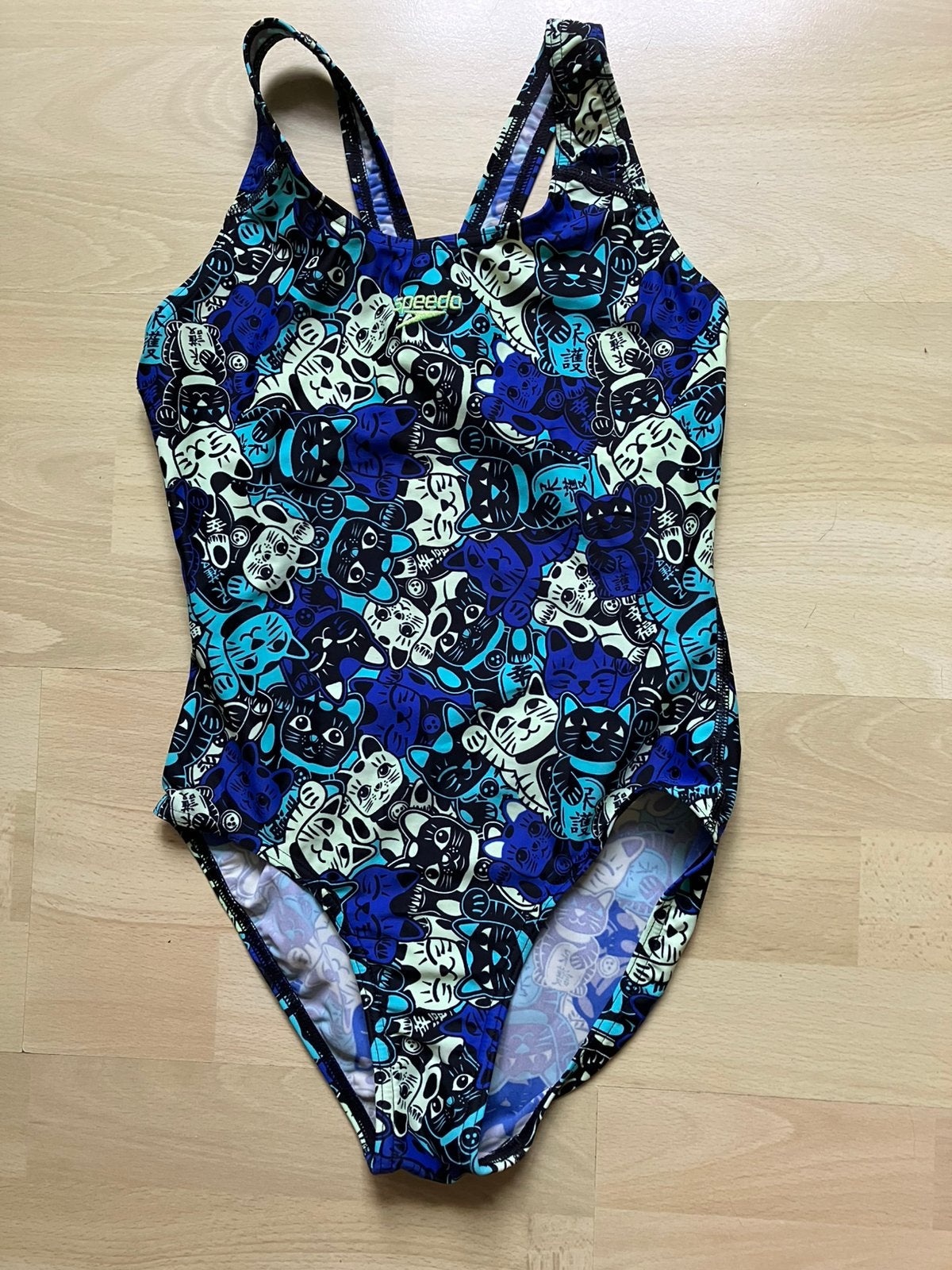 Speedo badpak blauw met print mt 164 zgan, Kinderen en Baby's, Ophalen of Verzenden, Zo goed als nieuw, Meisje, Sport- of Zwemkleding