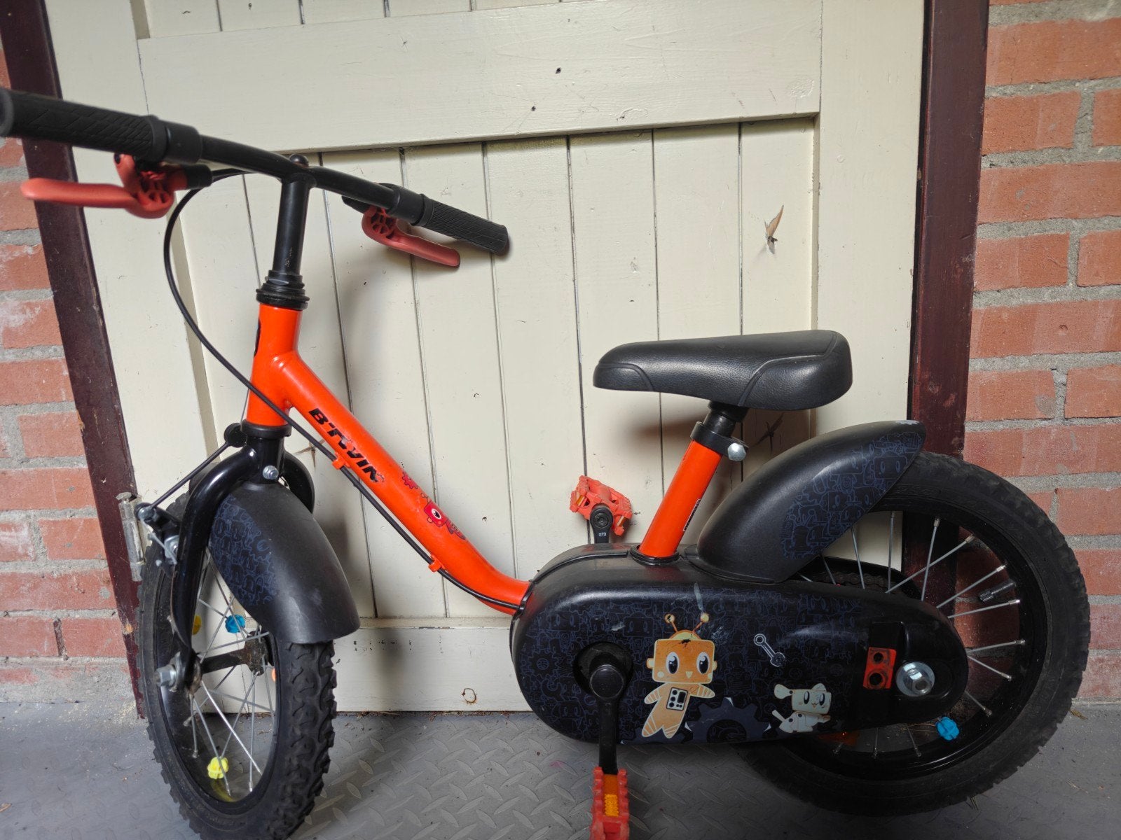 B'Twin kinderfiets 12 inch - Oranje, Ophalen, Gebruikt, Velgrem, Minder dan 16 inch
