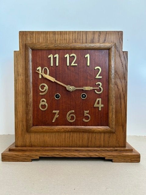 Amsterdamse school pendule, Ophalen