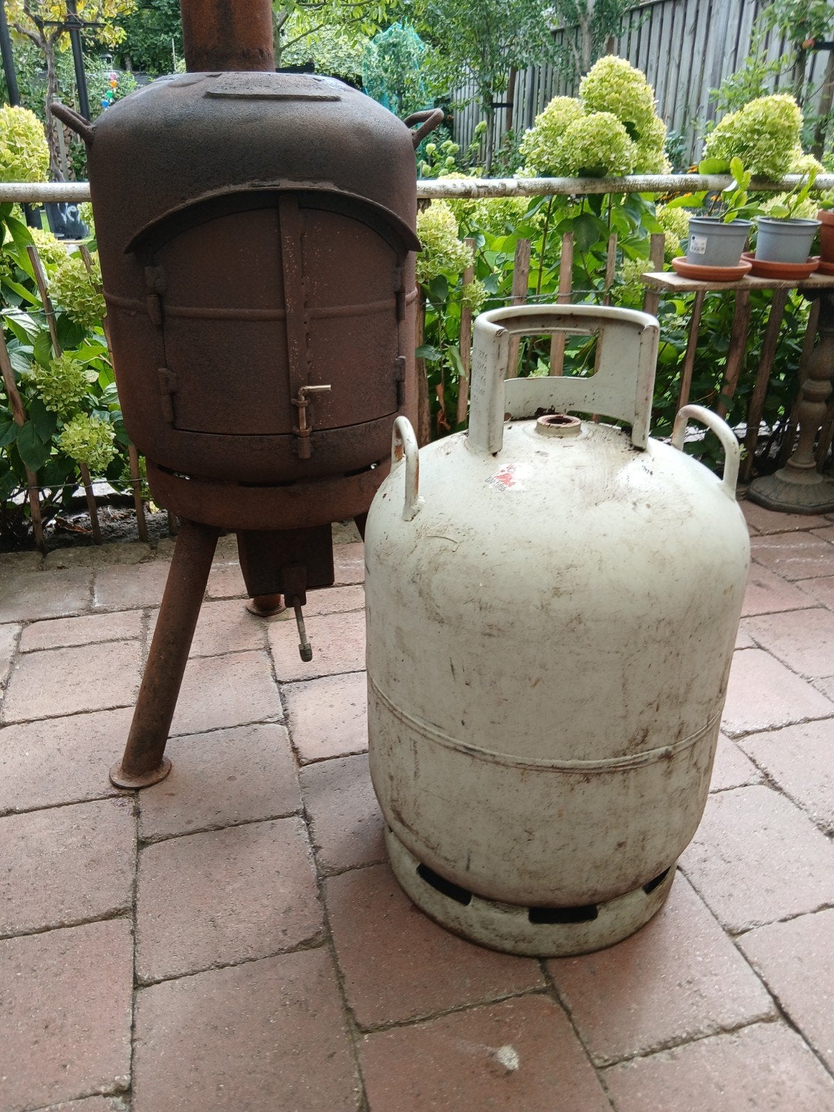 dikbuik gasfles lege gasfles, Ophalen