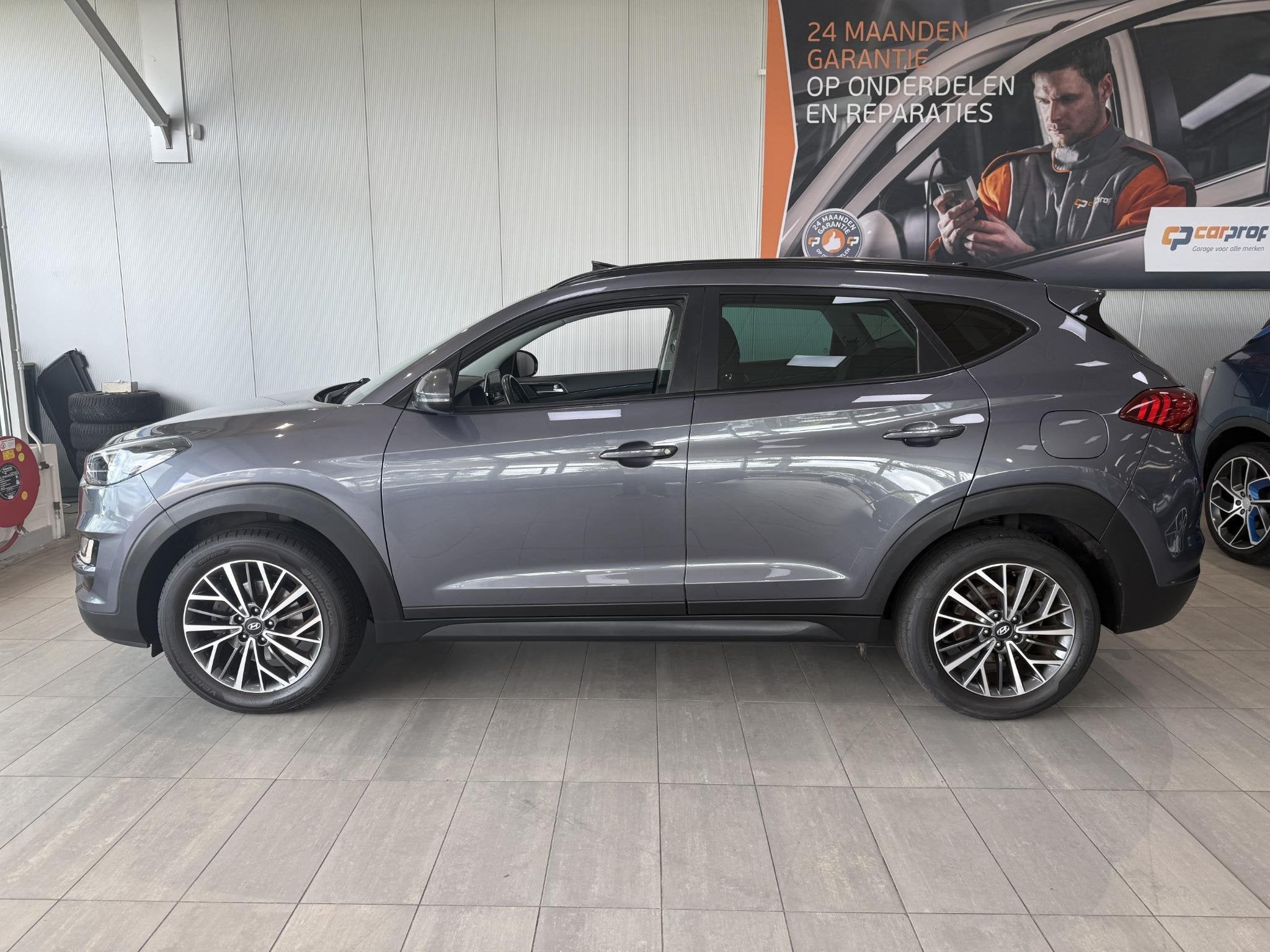 Hyundai Tucson 1.6 T-GDI Premium Panoramadak-Trekhaak, Auto's, Gebruikt, 4 cilinders, 1600 kg, SUV of Terreinwagen