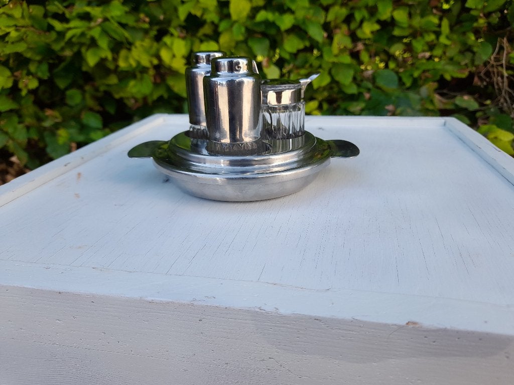 nieuwstaat vintage rvs met glas tafelsetje peper en zout en, Ophalen of Verzenden, Zo goed als nieuw