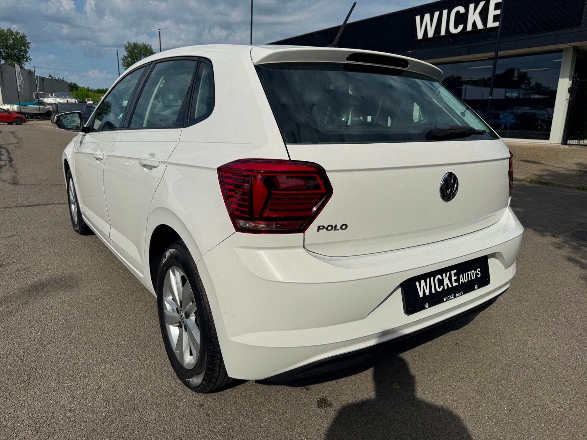 Volkswagen Polo 1.0 TSI 95 PK Comfortline Airco Stoelverw. 2, Stof, Gebruikt, Zwart, 95 pk