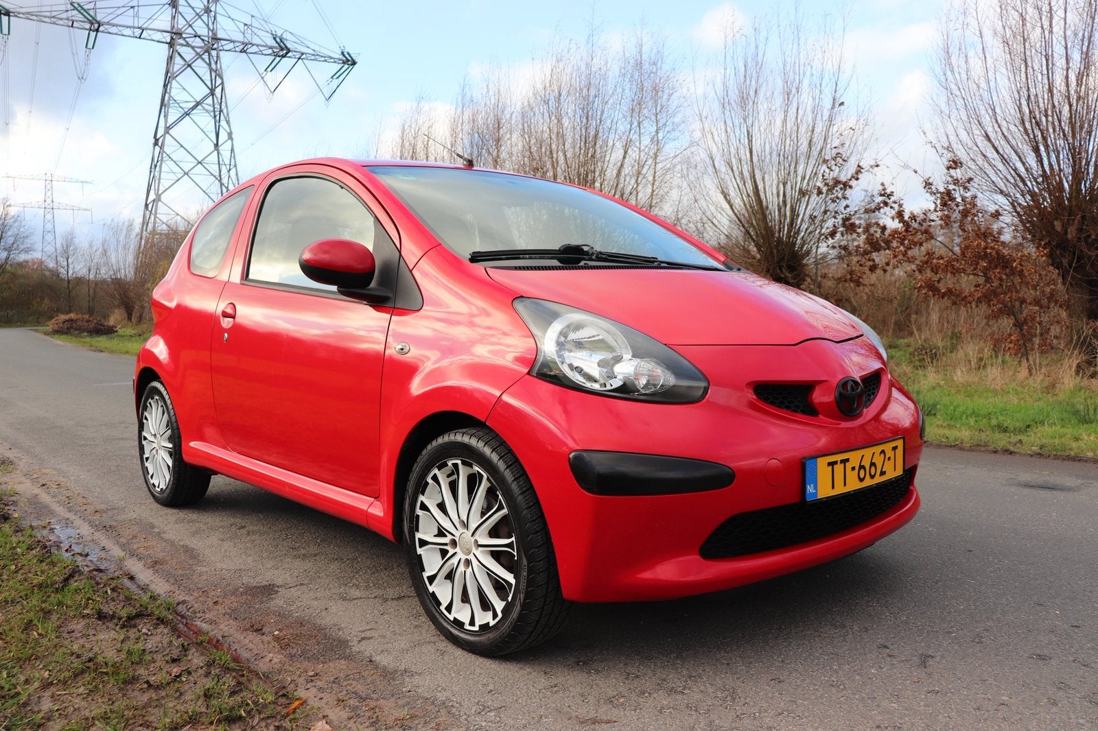 Toyota Aygo 1.0 12V 3DRS 2006 Rood, Voorwielaandrijving, 4 stoelen, 68 pk, Handgeschakeld
