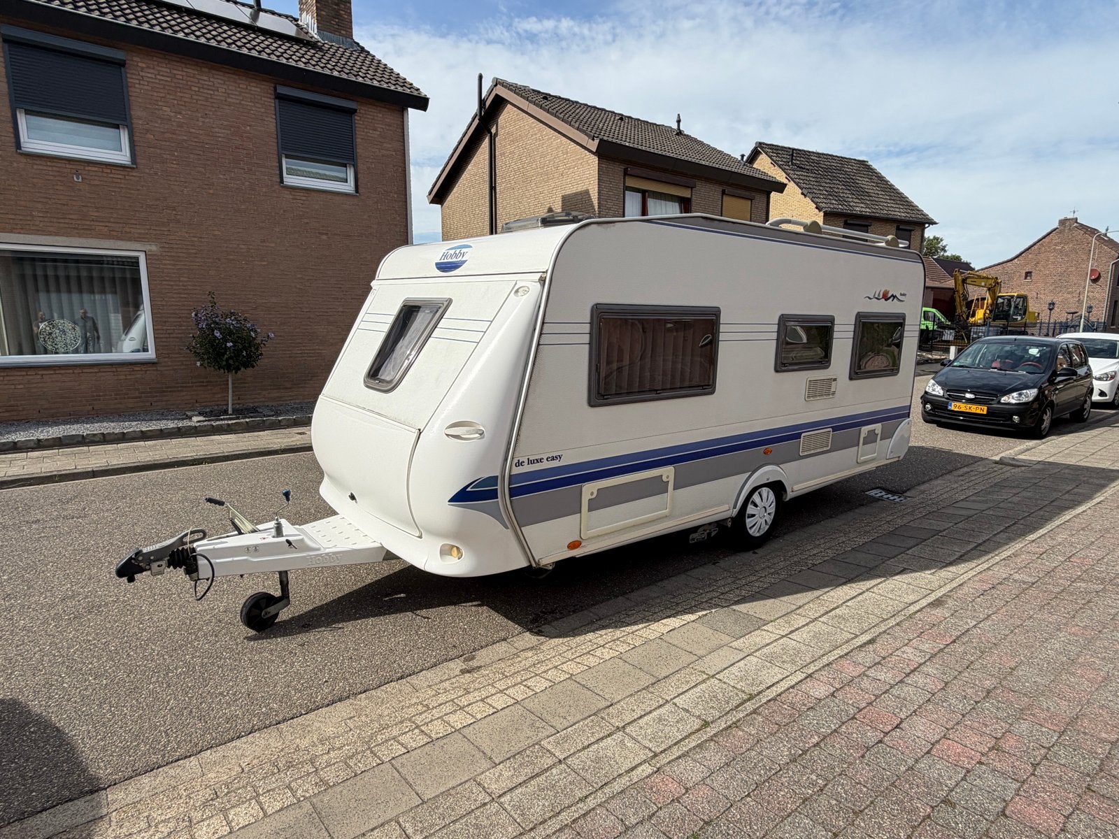 Hobby 460 UFE De Luxe Easy 2003 met unico voortent inboedel, Rondzit, Hobby, Frans bed, Particulier