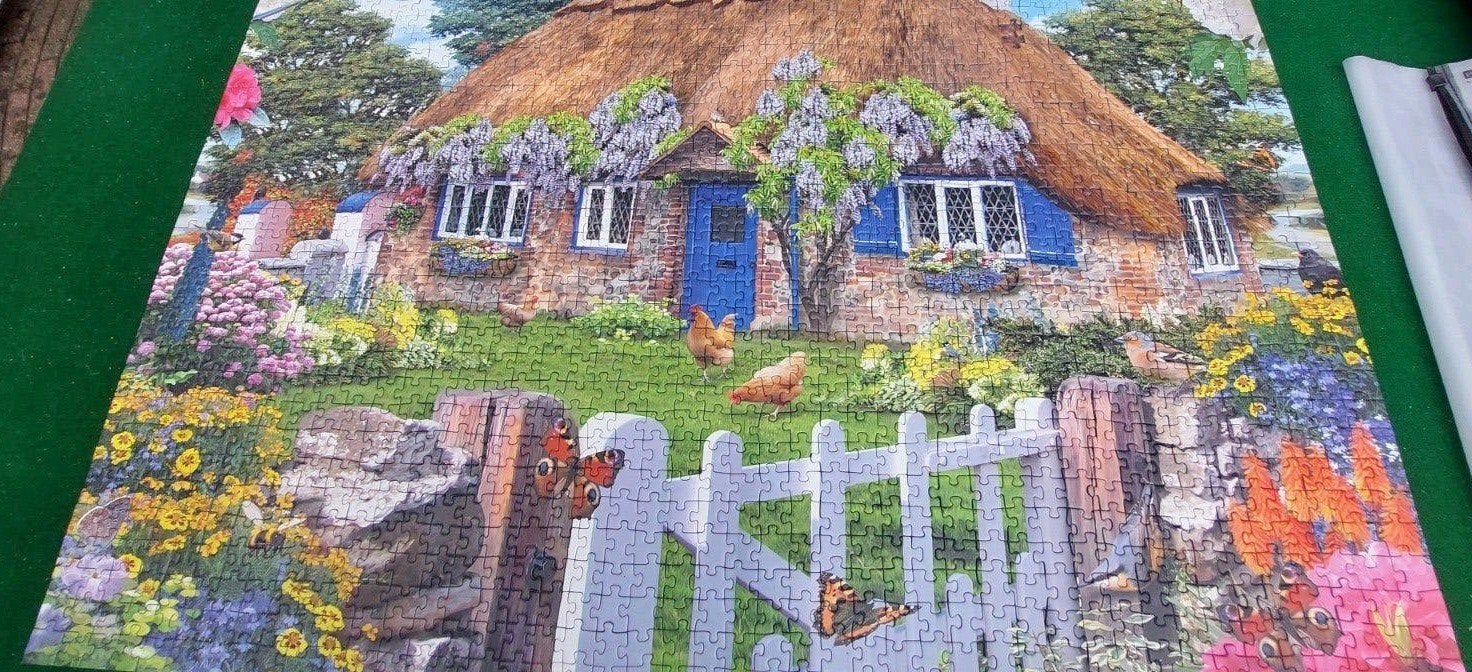 Ravensburger puzzel. Cottage in Engeland. 1500stukjes., Ophalen of Verzenden, 500 t/m 1500 stukjes, Zo goed als nieuw