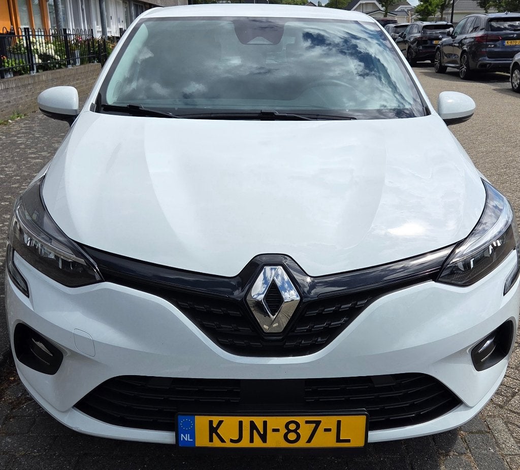 Renault Clio 1.6 E-tech Hybrid 2022 BIEDING VANAF 13950,-,-, Auto's, Renault, Stof, 4 cilinders, Navigatiesysteem, Wit