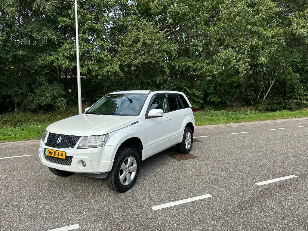Suzuki Grand Vitara 2.4 5D 2009 Wit, Auto's, Zwart, 4 cilinders, 1850 kg, Grand Vitara