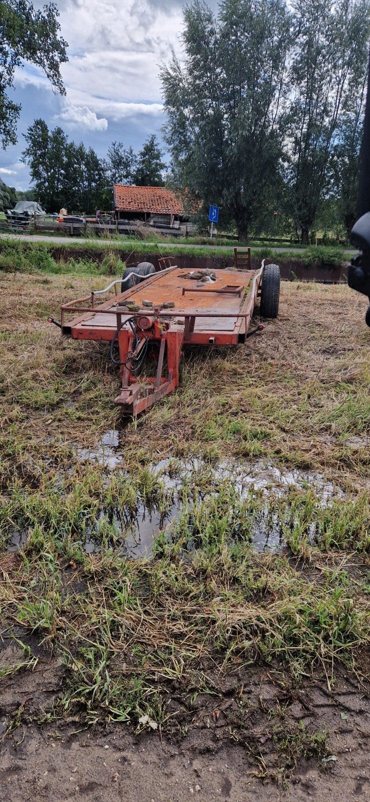 Lage kar voor minigraver of shovel met knikdissel, Ophalen