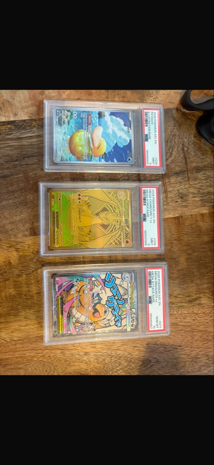 PSA Graded Pokémon Kaarten - Mega Dragonite, Charizard, Psyd, Ophalen of Verzenden, Zo goed als nieuw, Meerdere kaarten