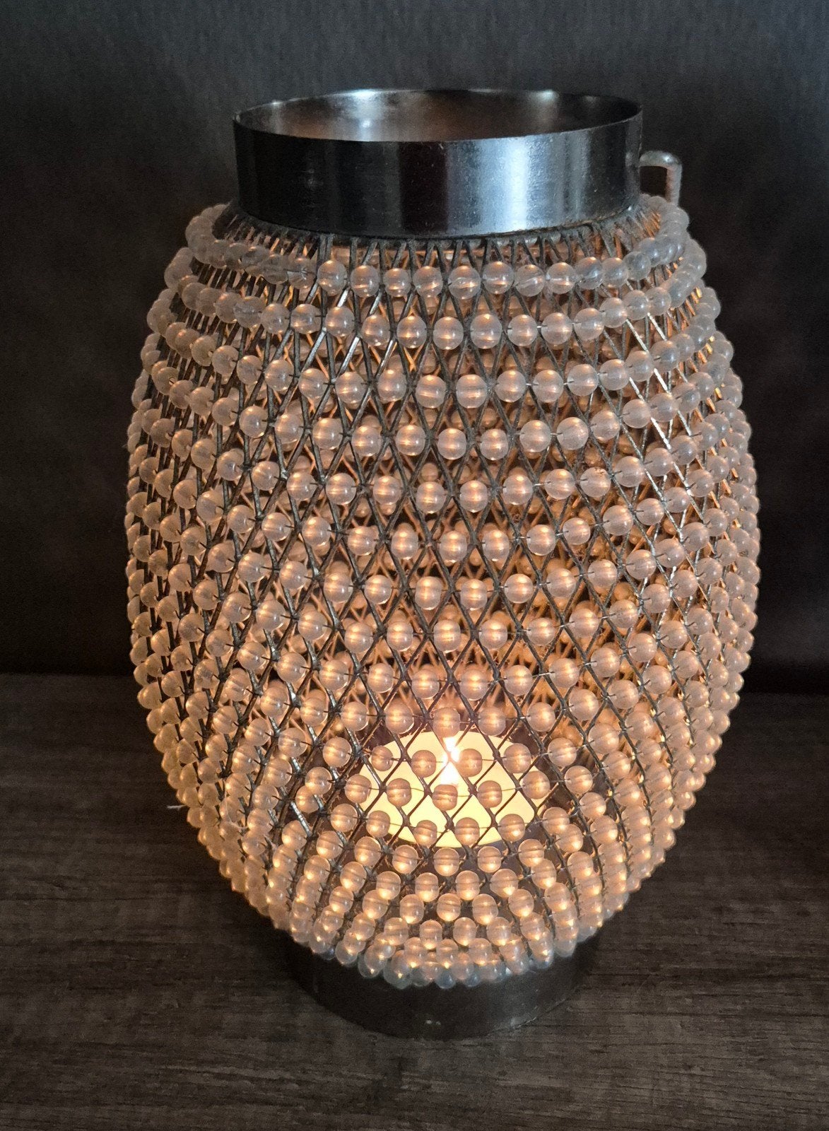 2 kralen Windlichten, Ophalen