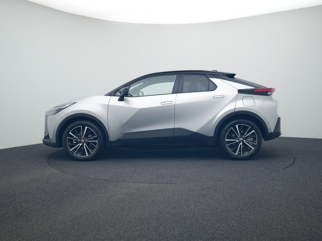Toyota C-HR 2.0 Plug-in Hybrid 220 Executive *NIEUW*, Auto's, Toyota, 12 maanden, 725 kg, 4 cilinders, Leder en Stof