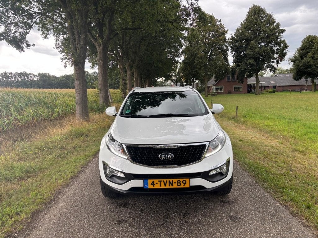 Kia Sportage 2.0 BusinessLine | Camera | Leder | Trekhaak |, Auto's, Kia, Gebruikt, 4 cilinders, Wit, Handgeschakeld