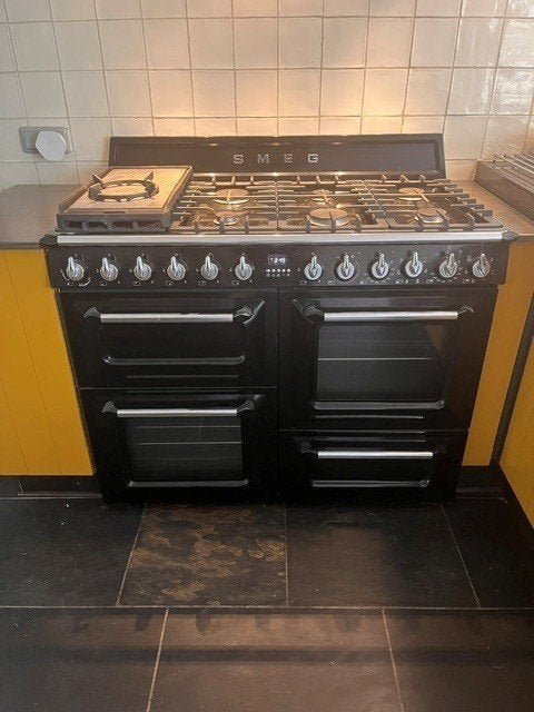 Te Koop Smeg 7-pits gasfornuis met ovens, Ophalen, Gebruikt, Warmhoudplaat, 60 cm of meer