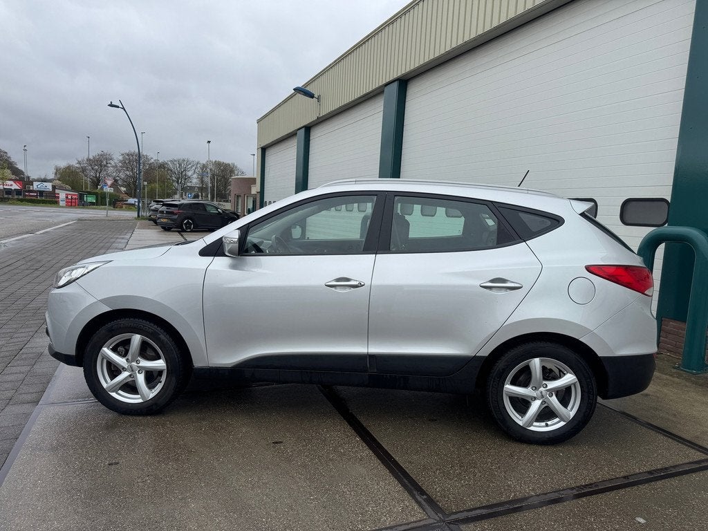 Hyundai Ix35 1.6i GDI Style, Auto's, Hyundai, Euro 5, 135 pk, 4 cilinders, Leder en Stof