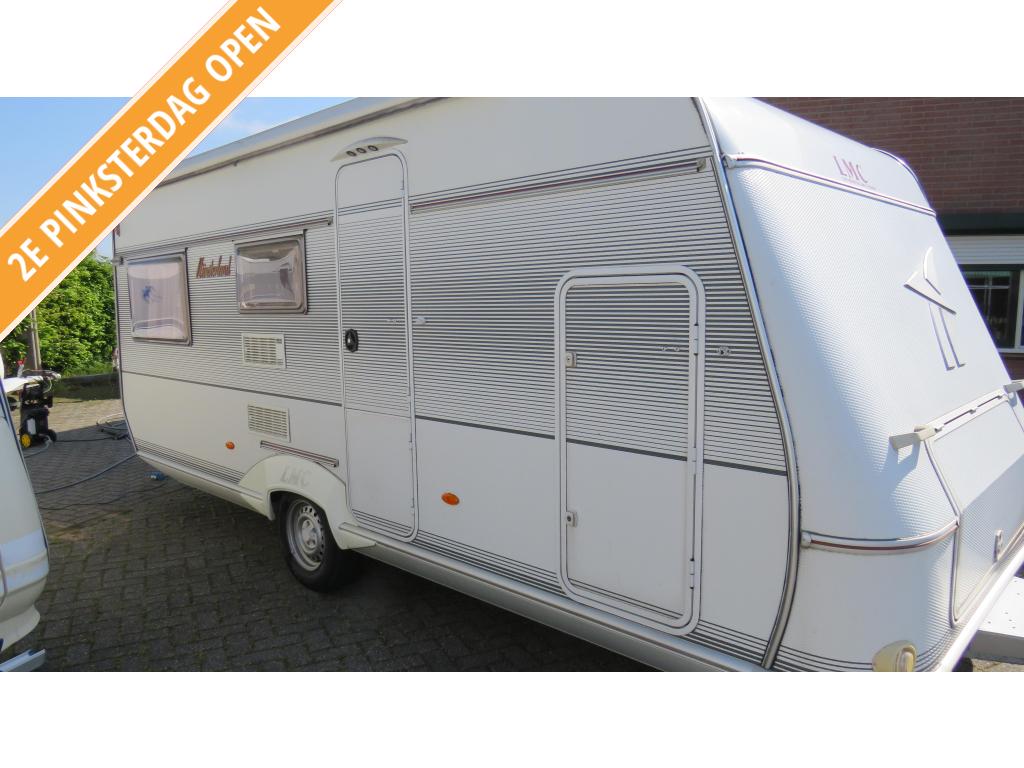 LMC MUNSTERLAND 530TK BJ 2003 STAPELBEDDEN €7999, Caravans en Kamperen, Caravans, Niet ingevuld, Dwarsbed, Rondzit, Bedrijf