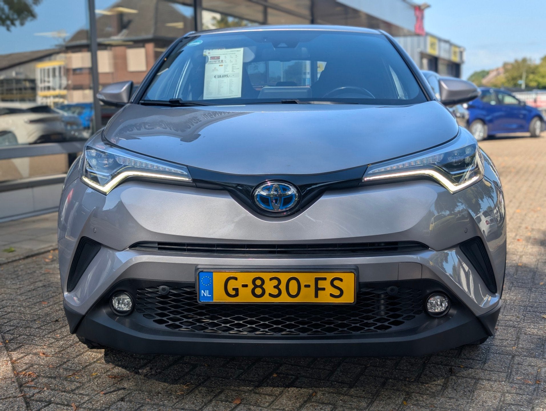 Toyota C-HR Toyota C-HR 1.8 Hybrid Bi-Tone, Rijklaarprijs /, Auto's, 12 maanden, Stof, Euro 6, 4 cilinders