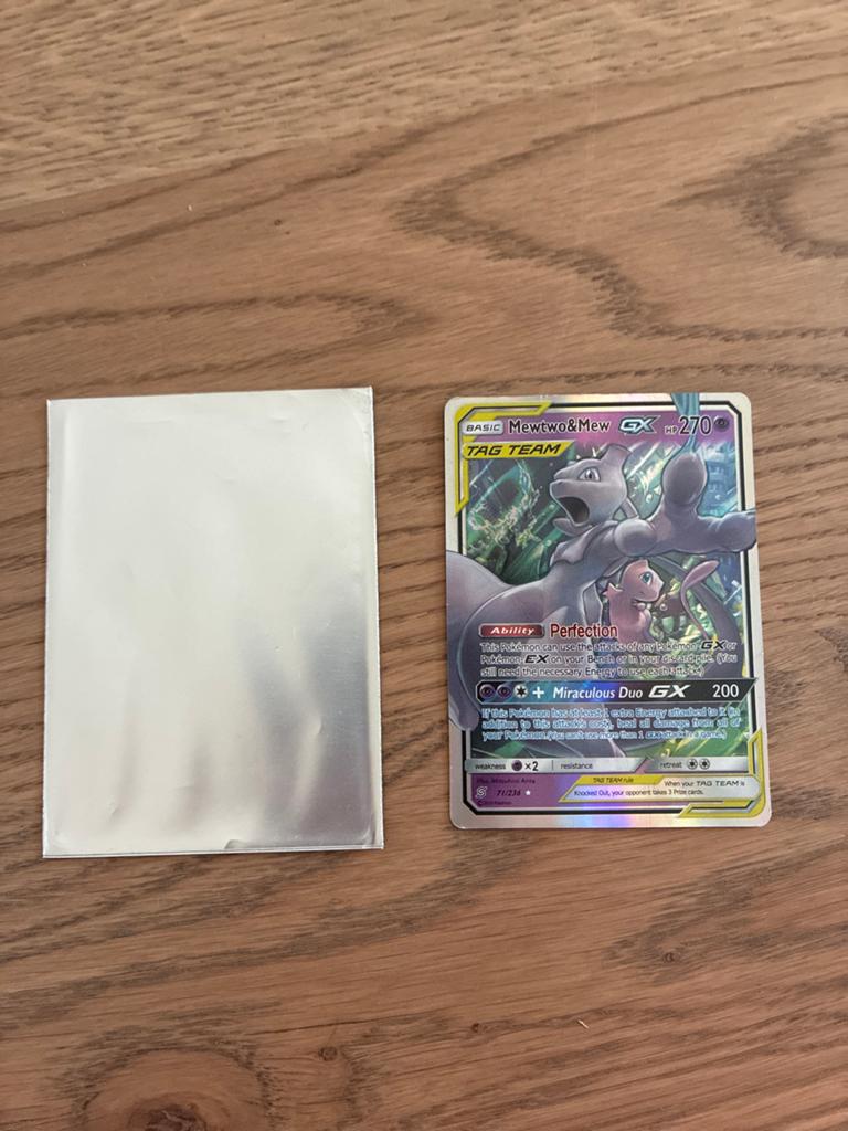 Mewtwo & Mew GX TAG TEAM Pokémon kaart + Pikachu sleeve, Ophalen of Verzenden, Zo goed als nieuw, Losse kaart
