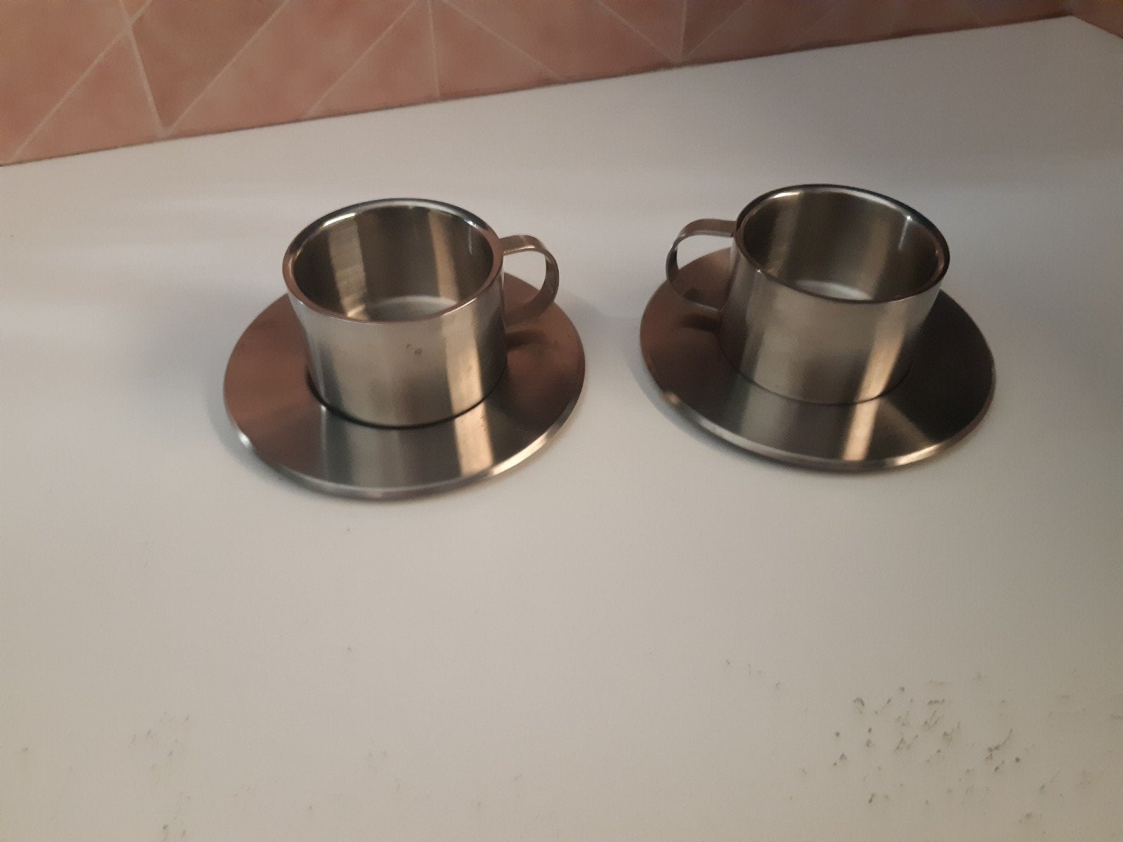 Set van 2 RVS kopjes met schotels, Ophalen, Gebruikt, Overige merken, Metaal
