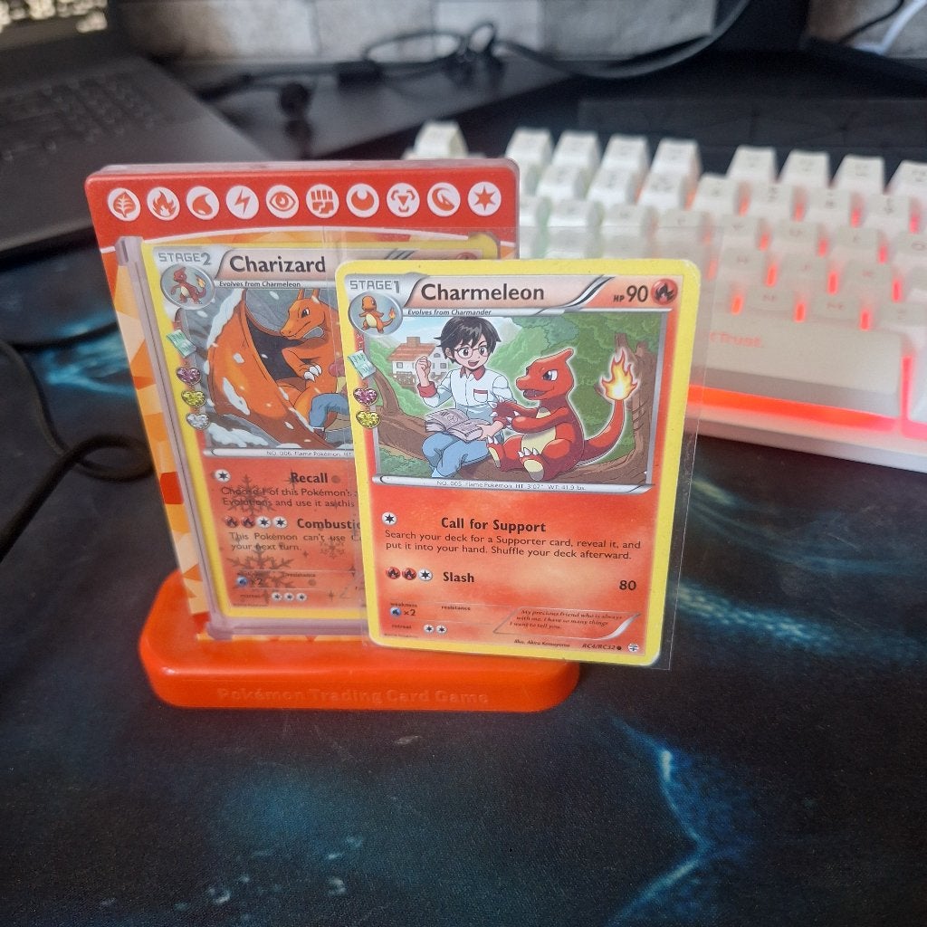 charizard rc5 &charmeleon rc4 + leuke houder, Ophalen of Verzenden, Gebruikt, Meerdere kaarten