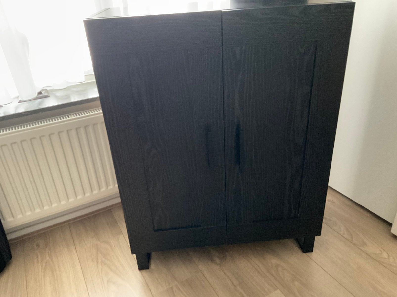 Zwart kastje, Ophalen, Zo goed als nieuw