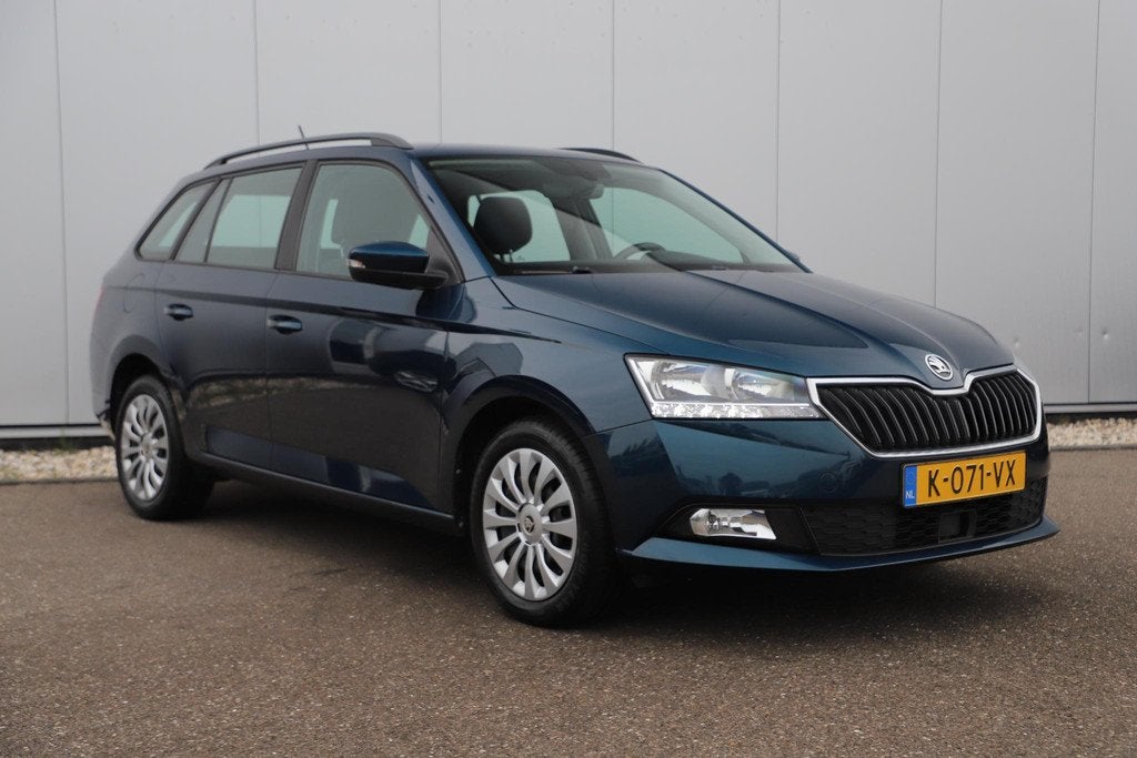 Skoda Fabia Combi 1.0 TSI Ambition 95PK Trekhaak Navigatie C, Auto's, Skoda, Voorwielaandrijving, Stof, Gebruikt, 95 pk