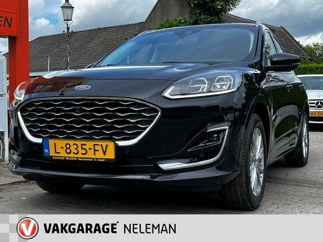 Ford Kuga 1.5 EcoBoost 150PK 2WD Vignale rijklaarprijs bovag, Voorwielaandrijving, 12 maanden, 15 km/l, Zwart