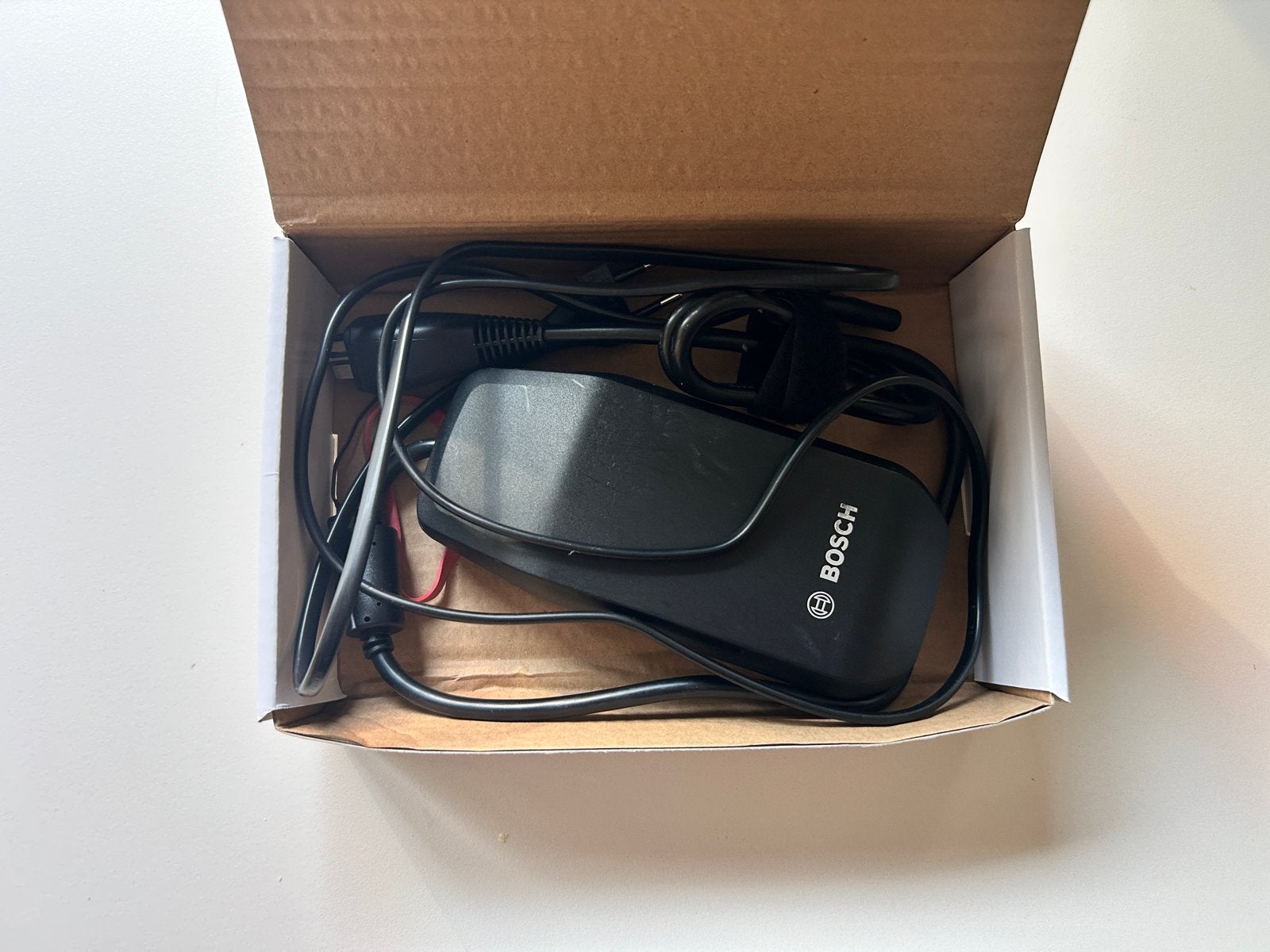 Bosch 2A Acculader voor E-bike - Nieuw in Doos, Fietsen en Brommers, Fietsaccessoires | Fietsaccu's, Ophalen of Verzenden, Nieuw