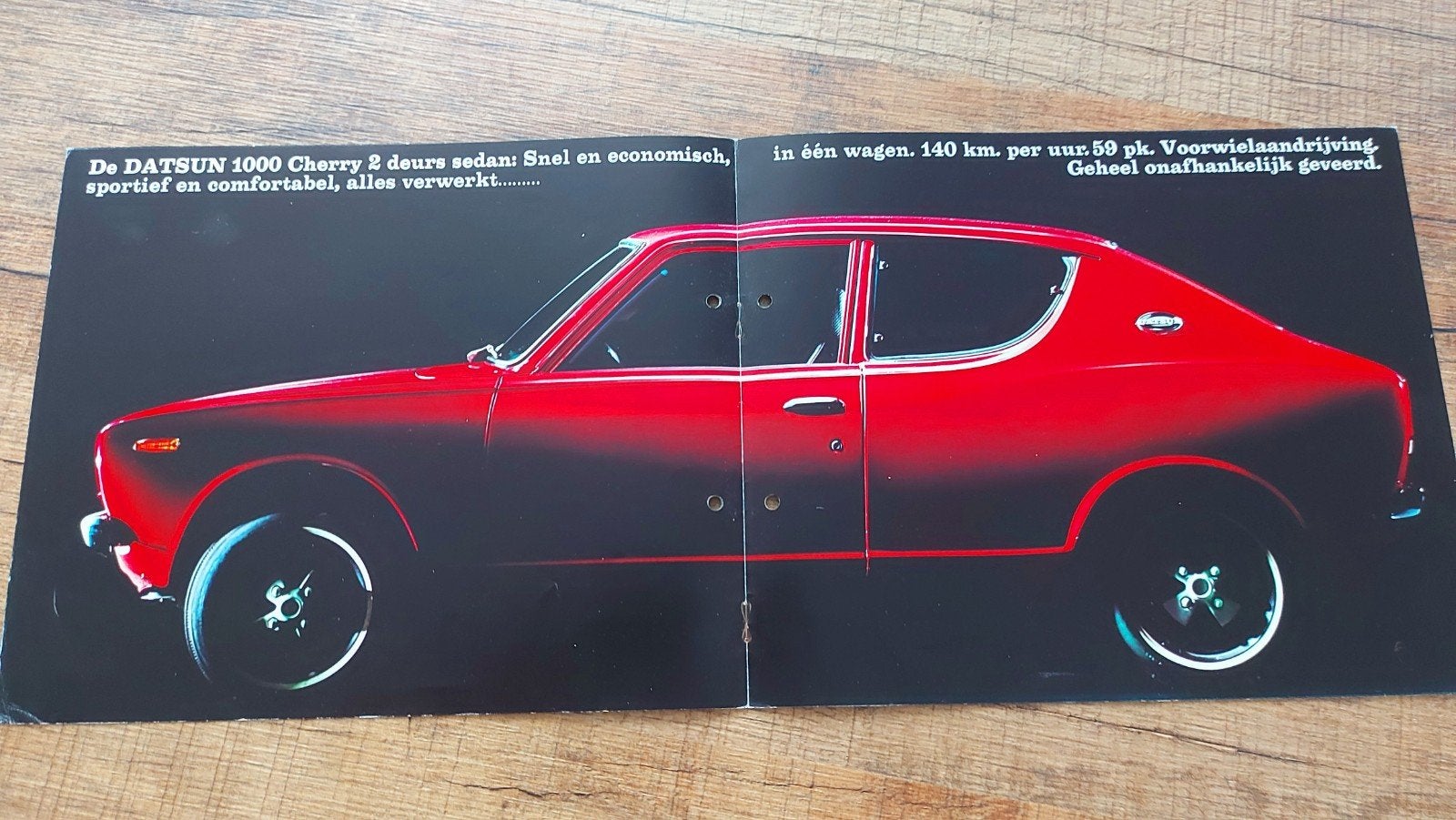Datsun 1000 Cherry folder geperforeerd, Ophalen of Verzenden, Zo goed als nieuw, Overige merken