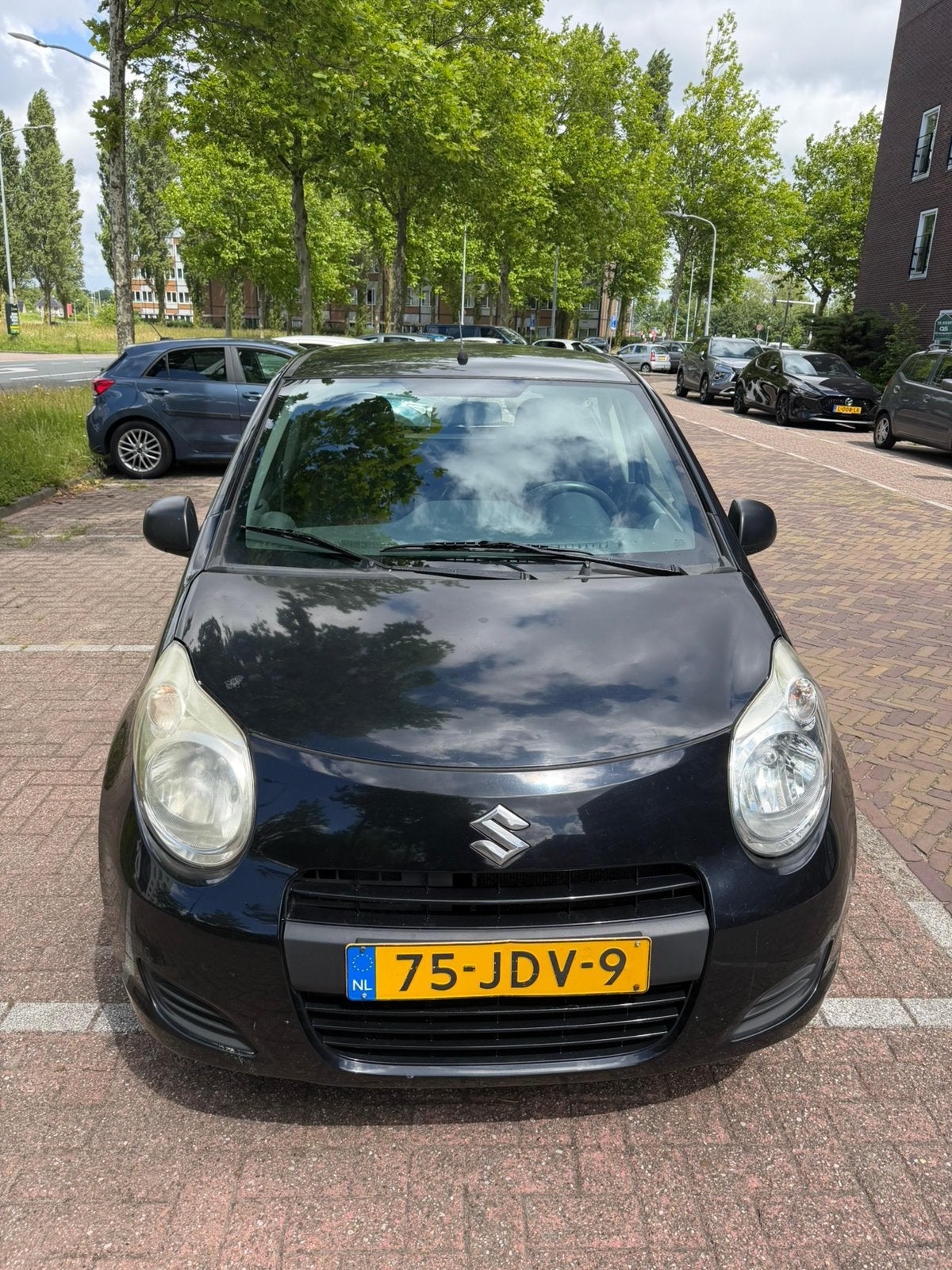 Suzuki Alto 1.0 2009 Zwart, Voorwielaandrijving, Stof, 4 stoelen, Origineel Nederlands