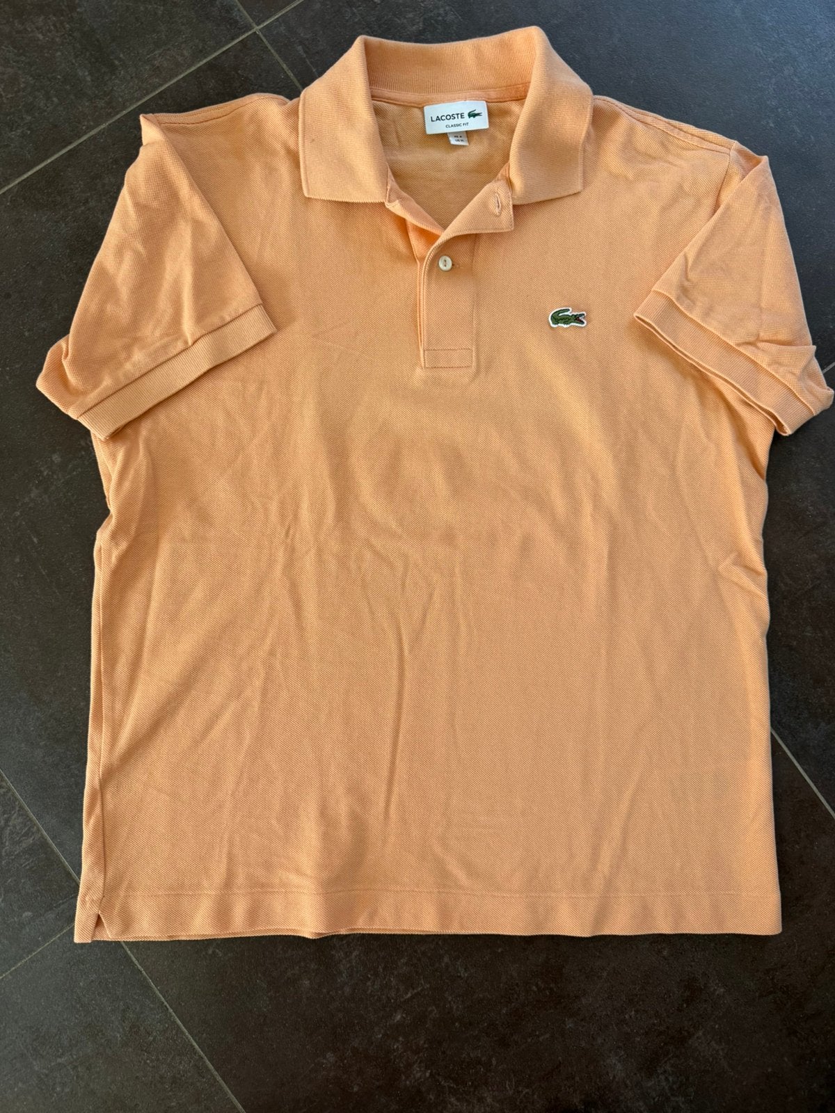 Nieuwe oranje lacoste poli maat M, Kleding | Heren, Polo's, Ophalen of Verzenden, Zo goed als nieuw, Oranje