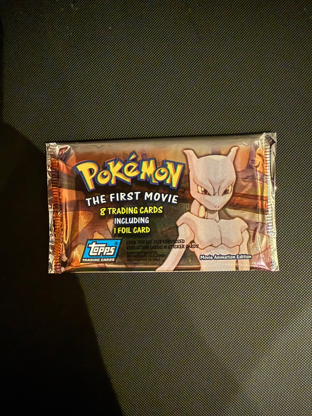 Pokémon Topps The First Movie | Blue Logo pack Sealed, Ophalen of Verzenden, Zo goed als nieuw, Foil