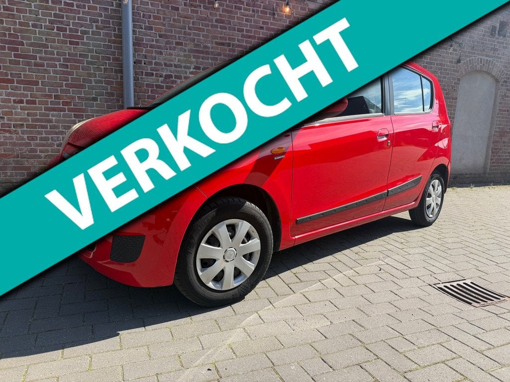 Daihatsu Cuore 1.0 Premium, Airco, Auto's, Daihatsu, Voorwielaandrijving, Stof, 18 €/maand, 4 stoelen