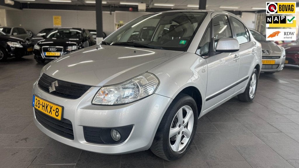 Suzuki SX4 1.6 Comfort automaat 128dzkm nap airco lm-velgen, Auto's, Suzuki, Stof, Gebruikt, Zwart, 4 cilinders