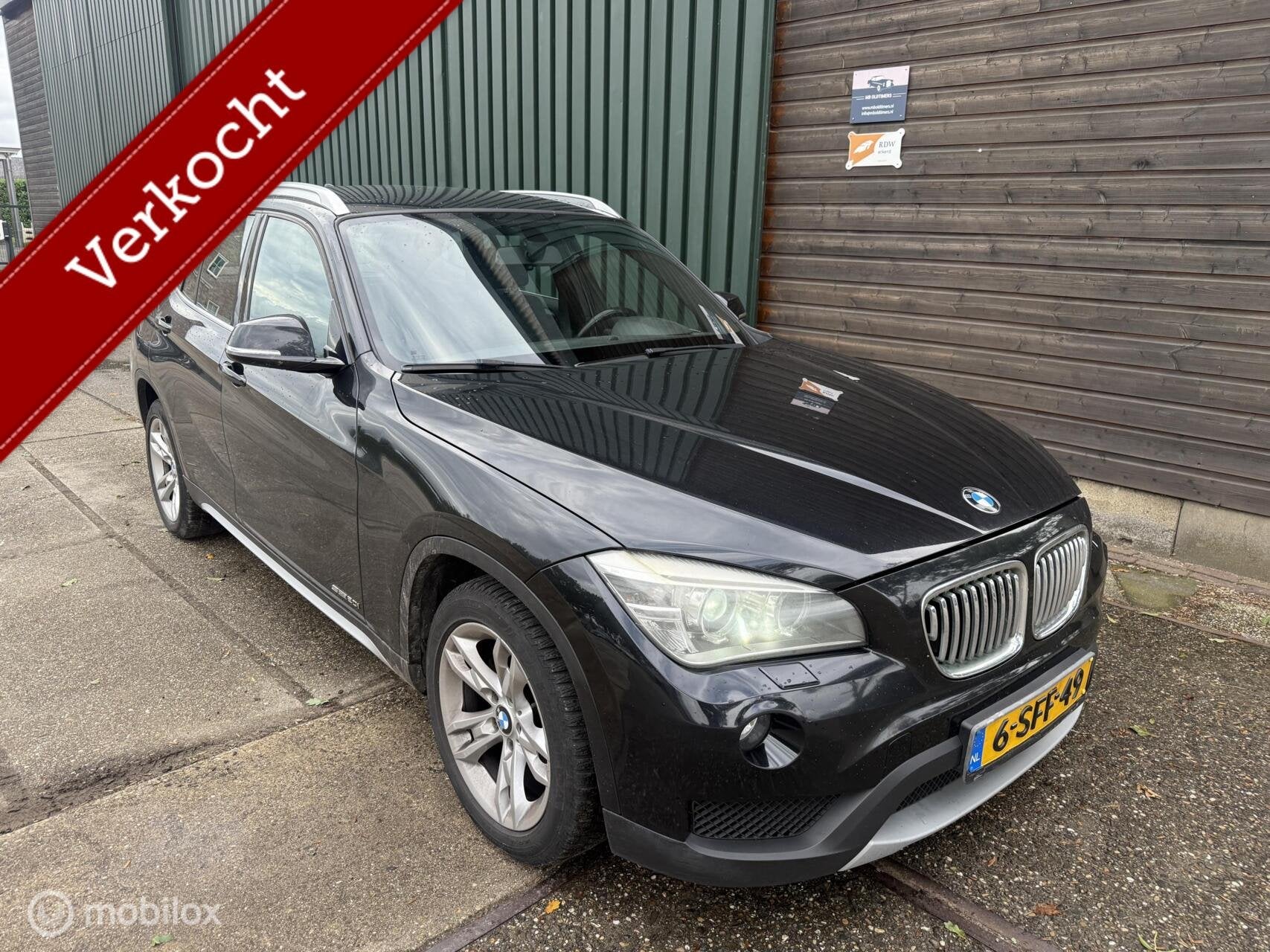 BMW X1 sDrive20i Executive AUT, Auto's, Parkeersensor, 4 cilinders, Zwart, Origineel Nederlands