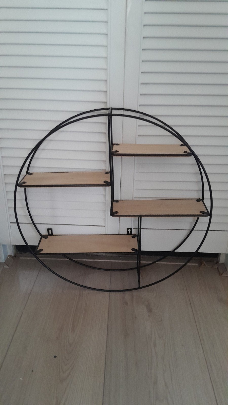 Rond wandrek met houten planken, Ophalen