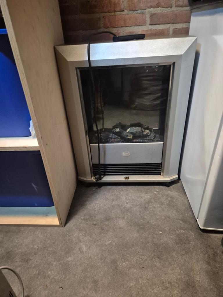 Sfeervolle elektrische haard - verwarmt en decoreert, Huis en Inrichting, Haarden, Ophalen of Verzenden, Vrijstaande haard, Elektrische haard