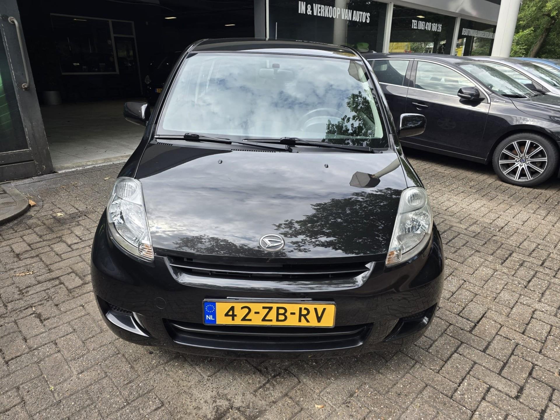 Daihatsu Sirion 2 1.0-12V Premium | 1E EIGENAAR |3/6 OF 12MN, Auto's, Voorwielaandrijving, Stof, Gebruikt, Zwart