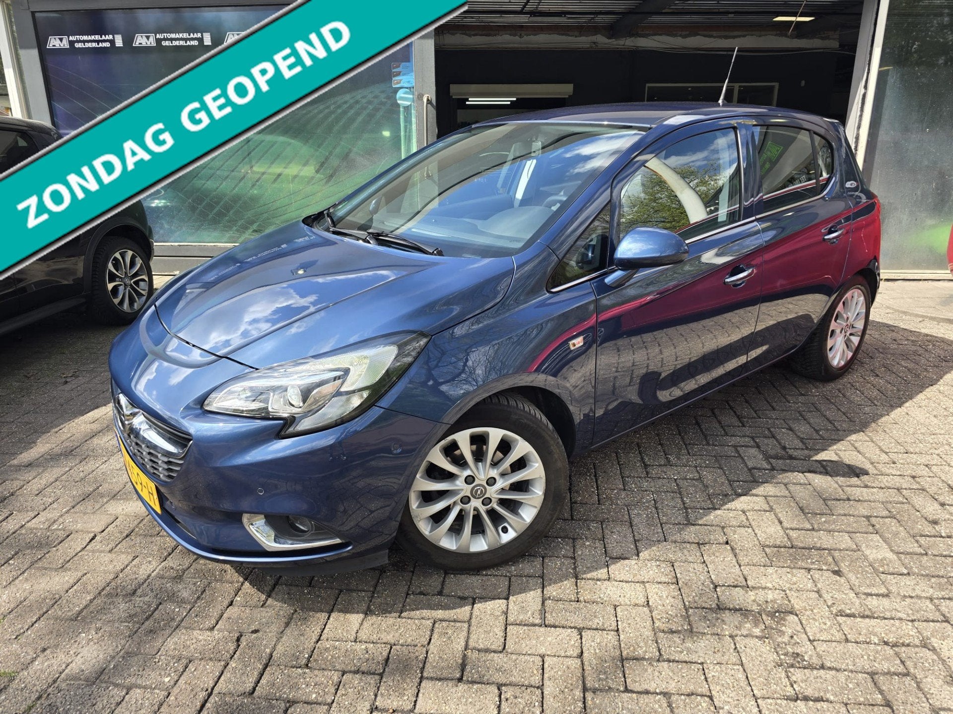 Opel Corsa 1.4 Cosmo | AUTOMAAT | 12MND GARANTIE | CAMERA |, Dealer onderhouden, 1063 kg, Gebruikt, 4 cilinders