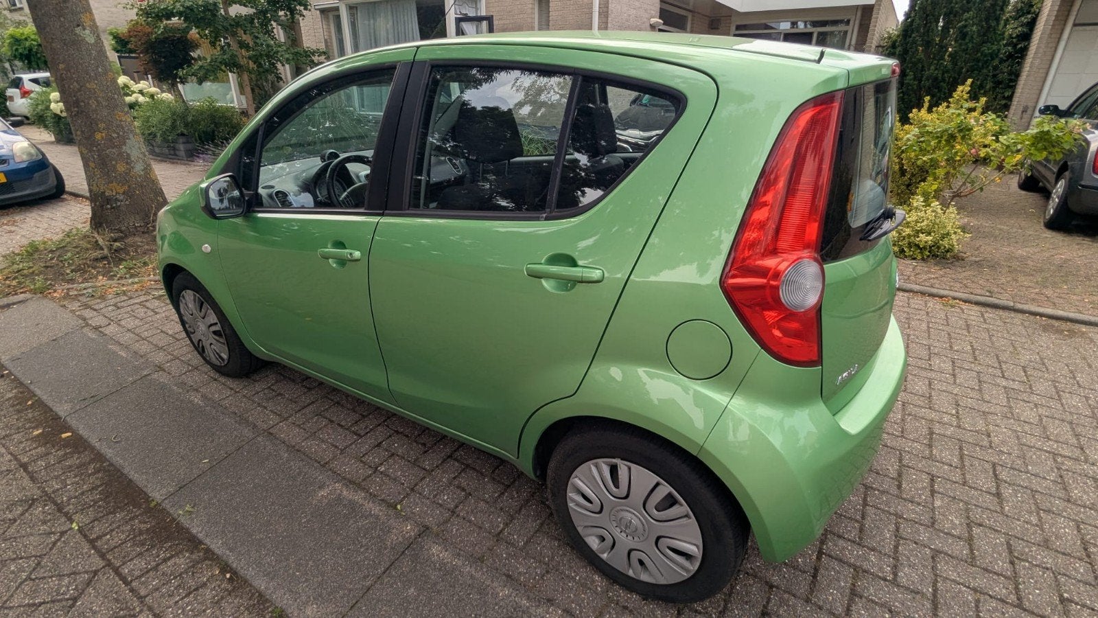 Opel Agila 1.2 16V 2009 Groen 110.500 km  - luxe uitvoering, Auto's, Voorwielaandrijving, 40 €/maand, 4 cilinders, 965 kg