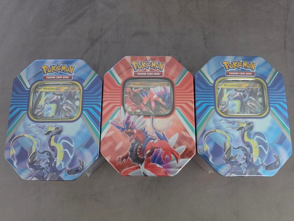 Paldea Legends Tin Miraidon & Koraidon EX Pokemon, Ophalen of Verzenden, Nieuw, Overige typen